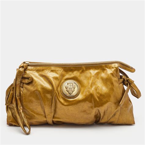 gucci gold soho clutch|Gucci hysteria clutch.